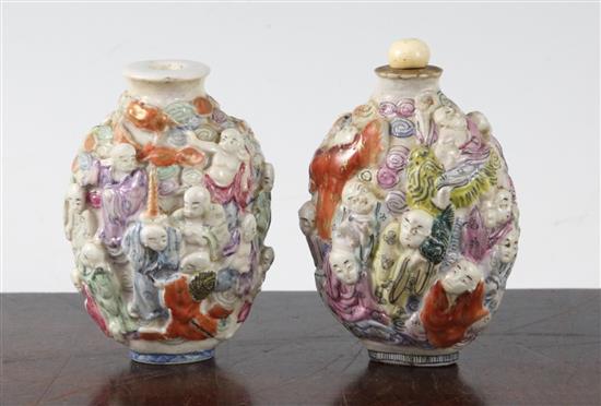 Two Chinese moulded famille rose eighteen luohan snuff bottles, Qianlong marks, but 1821-50, height 7.2cm, one with rim chips